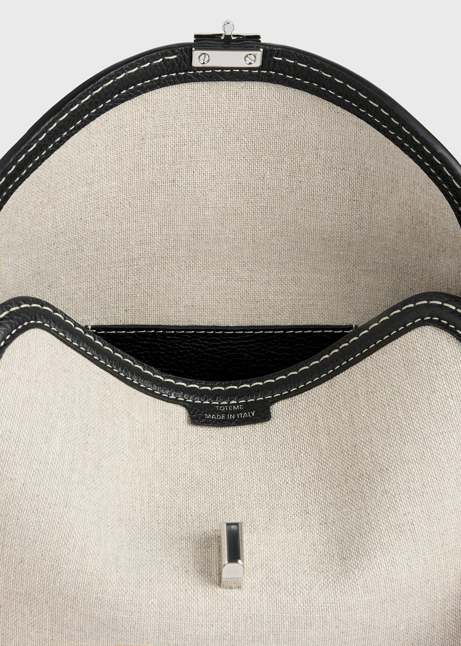 T-Lock canvas clutch ecru/black